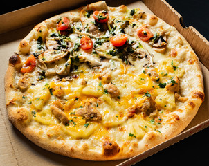 pizza on the black background