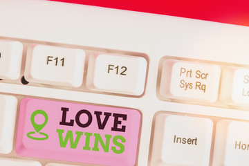Writing note showing Love Wins. Business concept for used to celebrate or commemorate the victory...