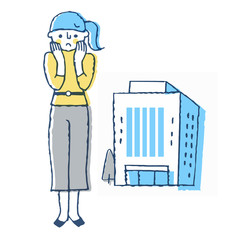 若い女性とオフィスビル　困った表情