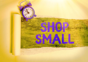 Conceptual hand writing showing Shop Small. Concept meaning nationwide movement that celebrates...