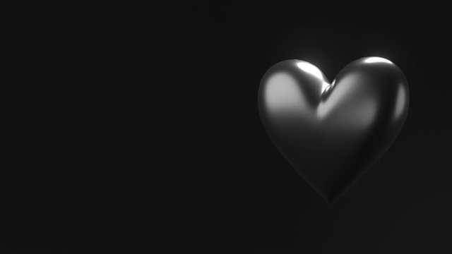 Black broken heart objects in black text space.
Heart shape object shattered into pieces.