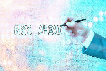 Conceptual hand writing showing Risk Ahead. Concept meaning A probability or threat of damage,...