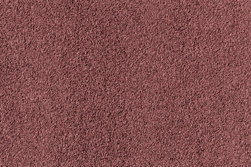 Pink bituminous waterproofing. Textured background.