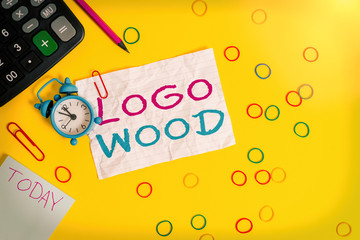 Conceptual hand writing showing Logo Wood. Concept meaning Recognizable design or symbol of a...