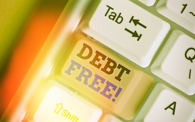 Conceptual hand writing showing Debt Free. Concept meaning does not owning any money or things to...