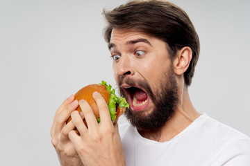 young man eating an apple