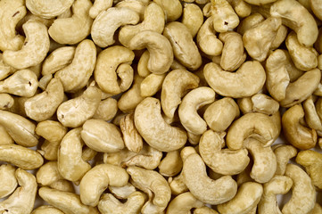Nut background of cashew nuts. Food background. Top view of cashew nuts
