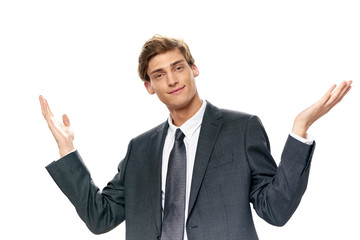 young businessman with arms raised