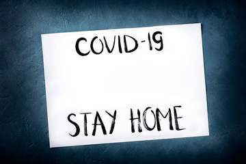Covid-19 design template with the Stay at home message and a place for text, handwritten lettering