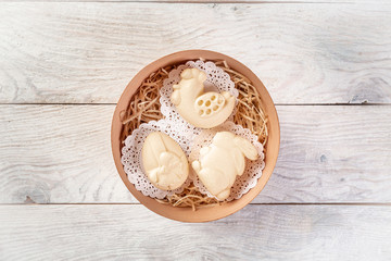 Fresh farm butter. Fresh homemade butter in bowl, on wooden background. Top view. Rustic still-life