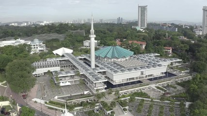 February 19th, 2020 - Kuala Lumpur, Malaysia : 4k Establishing b-roll aerial view of National Mosque. Malay Vernacular Architecture. Rising Shot