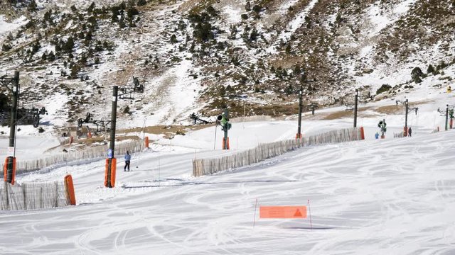 Beginners practicing on even ground in Vallter ski complex, Catalonia, Spain