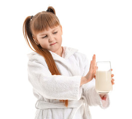 Little girl with milk allergy on white background