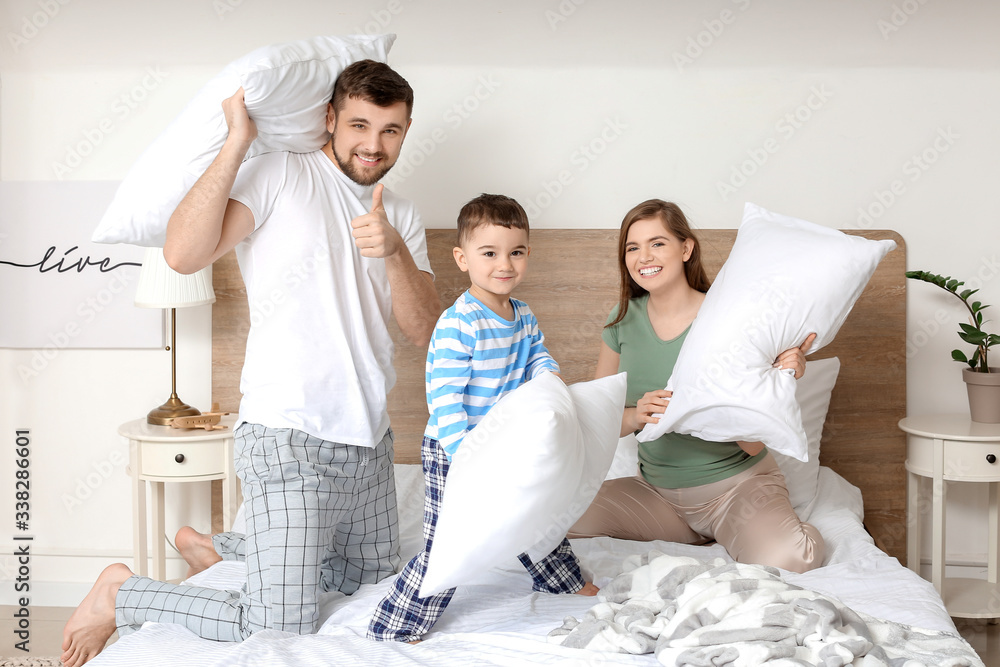 Sticker Pillow fight between happy family in bedroom