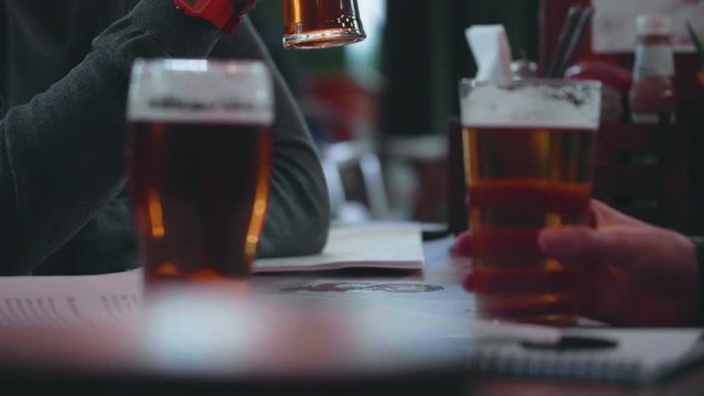 Casually Drinking Beer in an English Pub