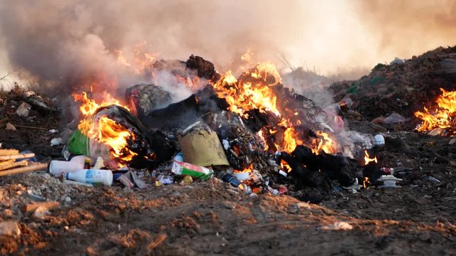 fire close up. burning garbage. concern for the environment. environmental pollution.