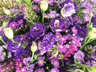 Bouquet of beautiful purple flowers background.