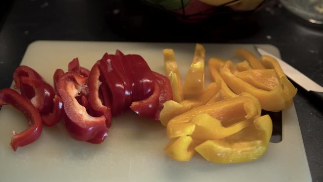 Pappers vegetable yellow and red on board in kitchen