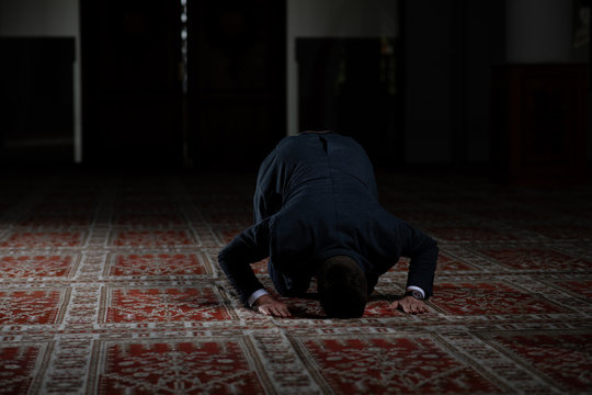 Businessman Muslim Praying in Mosque