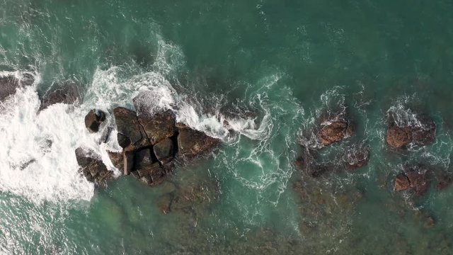 Aerial: Drone Sri Lanka rocks in the sea