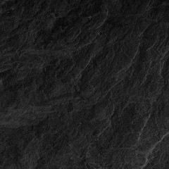 Dark grey black slate background or texture.