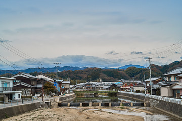 Bridges and villages with rivers and mountains