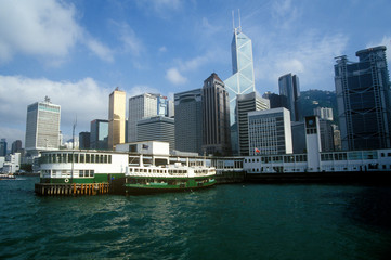 Fototapeta na wymiar Boat at dock in Hong Kong Harbor