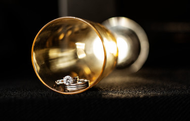 Two training rings in a glass