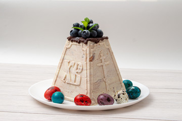 Marble Easter cake with engraving on a white background