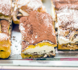 the real pastry, pastries prepared in the artisan laboratory,, pastries with cream, cream, chocolate and candied fruit