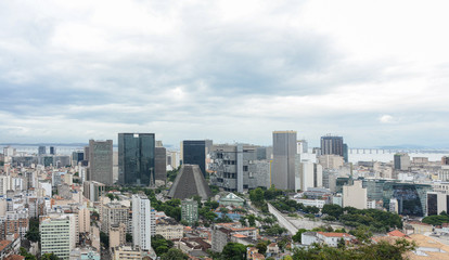 Fototapeta na wymiar RIO DE JANEIRO, BRAZIL - JANUARY 3, 2020: Panoramic view of Rio's downtown with The Metropolitan Cathedral, Financial District, the Lapa Arches and Guanabara Bay in the background