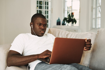 man of african appearance laptop