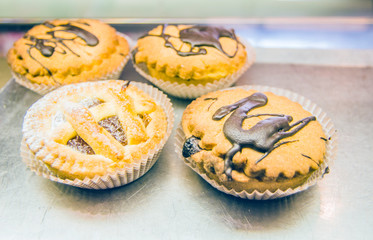 the real pastry, pastries prepared in the artisan laboratory,, pastries with cream, cream, chocolate and candied fruit