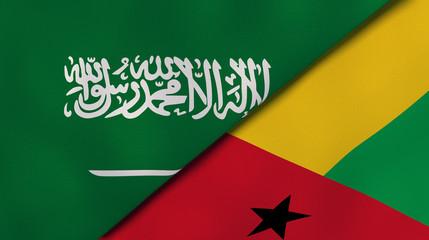 The flags of Saudi Arabia and Guinea Bissau. News, reportage, business background. 3d illustration