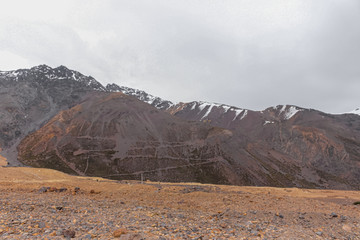 Mountain landscape during winter in Lo Valdés Valley, Cajón del Maipo, Central Andes of Chile.