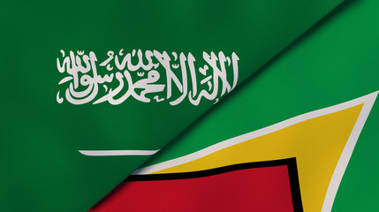 The flags of Saudi Arabia and Guyana. News, reportage, business background. 3d illustration