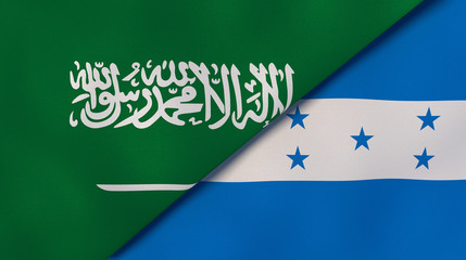 The flags of Saudi Arabia and Honduras. News, reportage, business background. 3d illustration