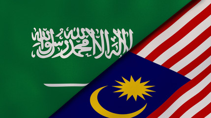 The flags of Saudi Arabia and Malaysia. News, reportage, business background. 3d illustration