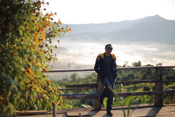 Fototapeta premium Men enjoy the view of Phu Lanka in the morning in Phayao, Thailand