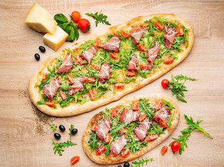 italian pizza on the wooden background