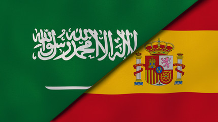 The flags of Saudi Arabia and Spain. News, reportage, business background. 3d illustration