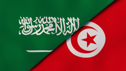 The flags of Saudi Arabia and Tunisia. News, reportage, business background. 3d illustration