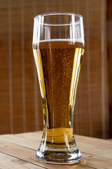 Tall glass with beer. A pint of beer