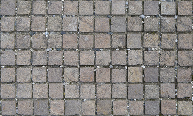 Square lined pattern. Cobblestone or stone pavement, walkway or road. The surface of rough stones....