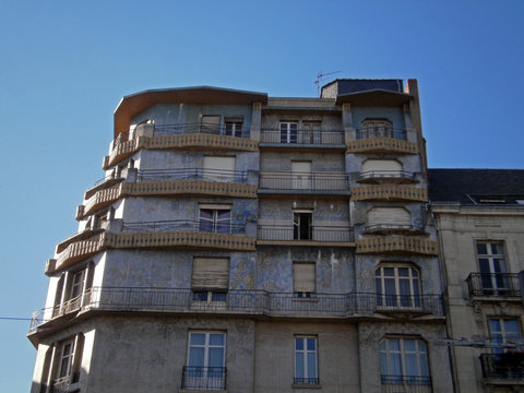 Angers, France - September 15th 2013 : Focus on 'La maison Bleue' (The blue house), a famous building of 1929. It's the largest facade covered with mosaic in Art Deco style of the world.