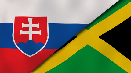 The flags of Slovakia and Jamaica. News, reportage, business background. 3d illustration