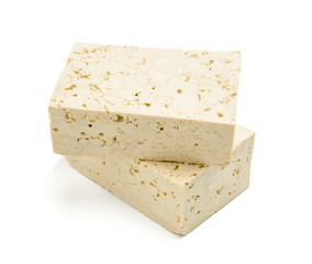 Tasty tofu cheese on white background
