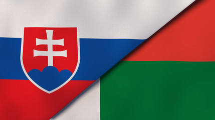 The flags of Slovakia and Madagascar. News, reportage, business background. 3d illustration