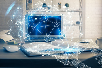 Computer on desktop with social network theme icon. Multi exposure. Concept of international connections.