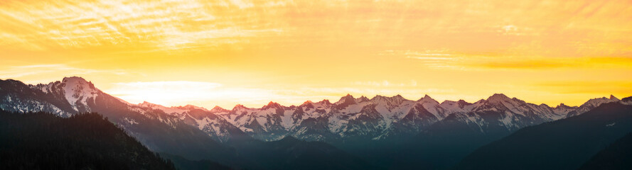 panorama of Mountain peaks landscape at sunset.